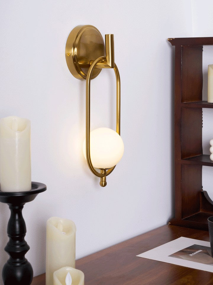 Brushed Brass Wall Sconce with Frosted Glass Globe