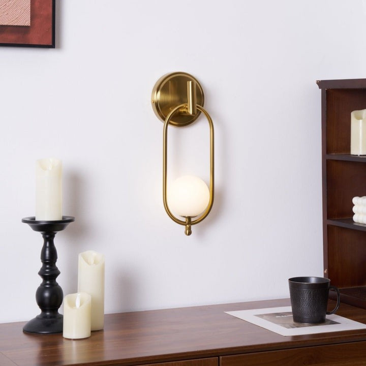 Brushed Brass Wall Sconce with Frosted Glass Globe