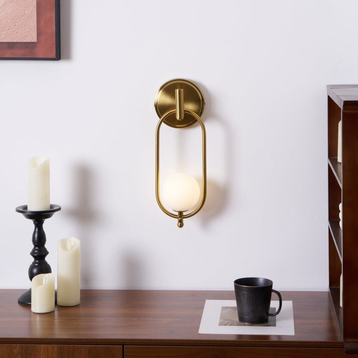 Brushed Brass Wall Sconce with Frosted Glass Globe