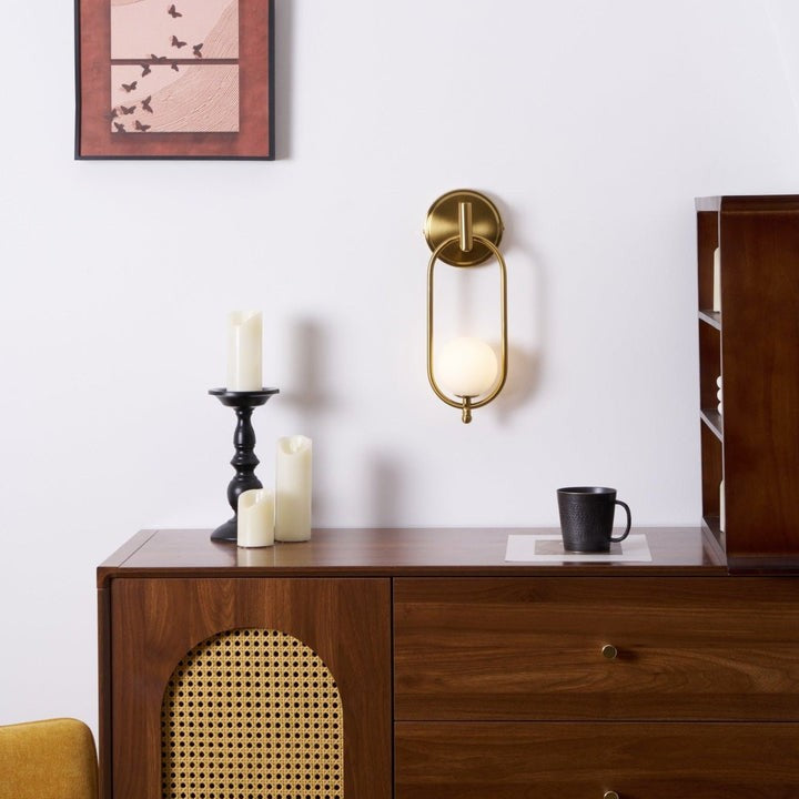 Brushed Brass Wall Sconce with Frosted Glass Globe