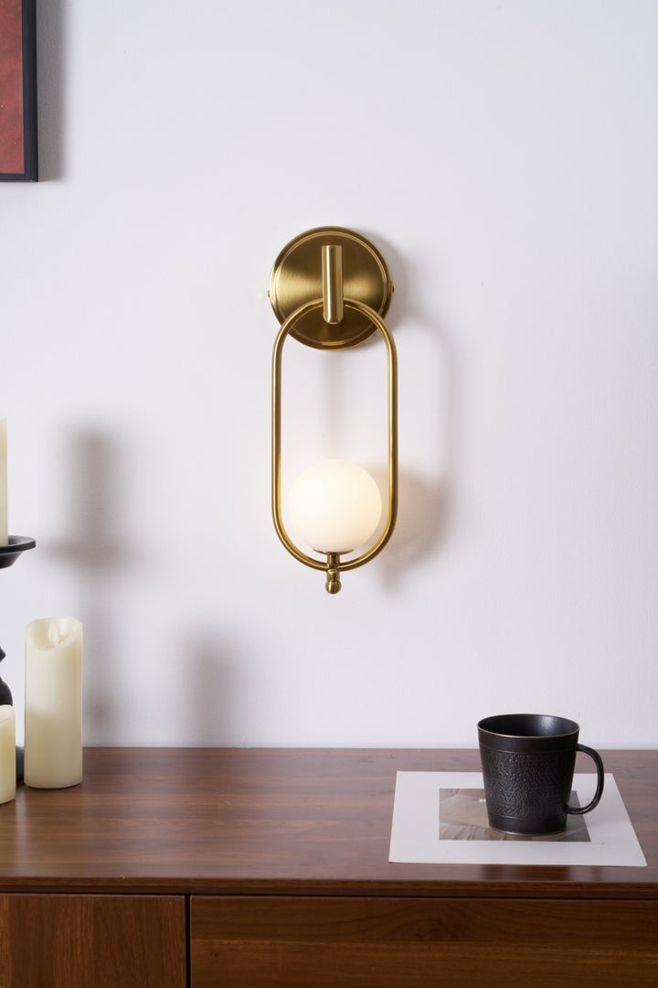 Brushed Brass Wall Sconce with Frosted Glass Globe