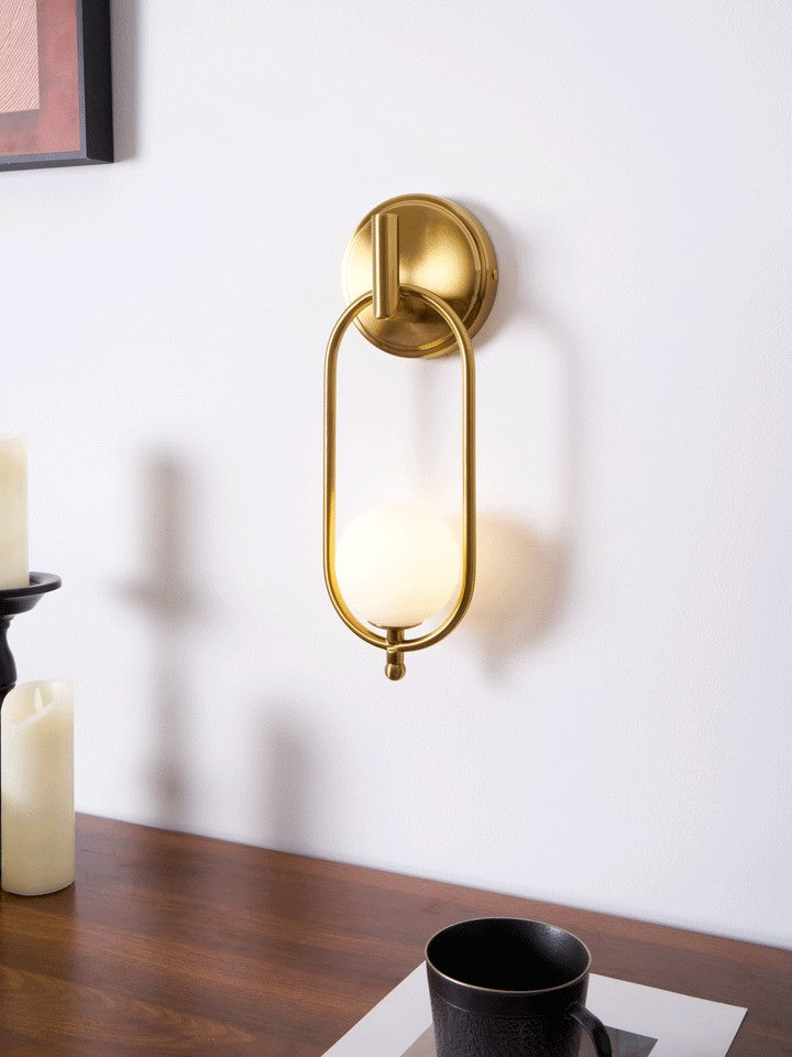 Brushed Brass Wall Sconce with Frosted Glass Globe