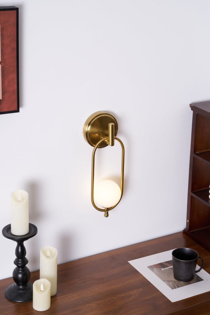 Brushed Brass Wall Sconce with Frosted Glass Globe