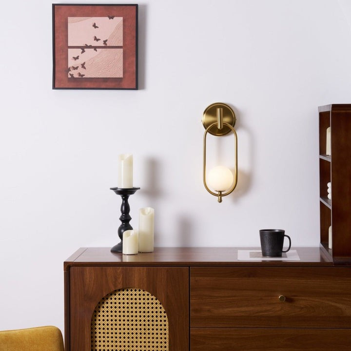 Brushed Brass Wall Sconce with Frosted Glass Globe