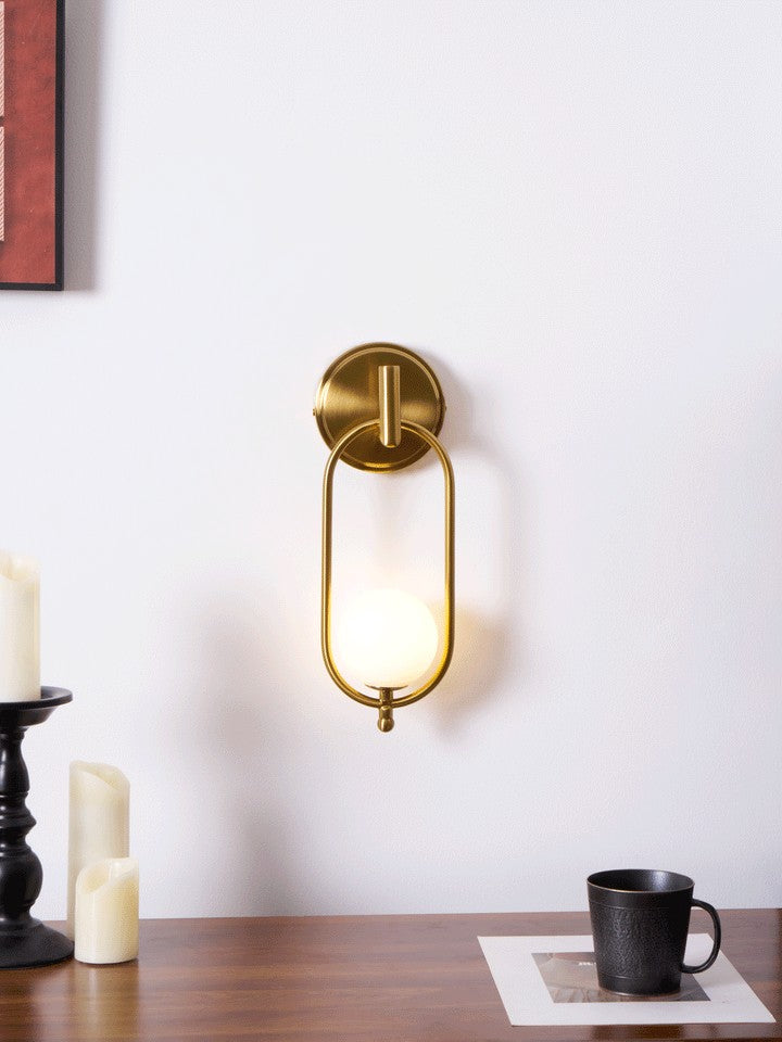 Brushed Brass Wall Sconce with Frosted Glass Globe