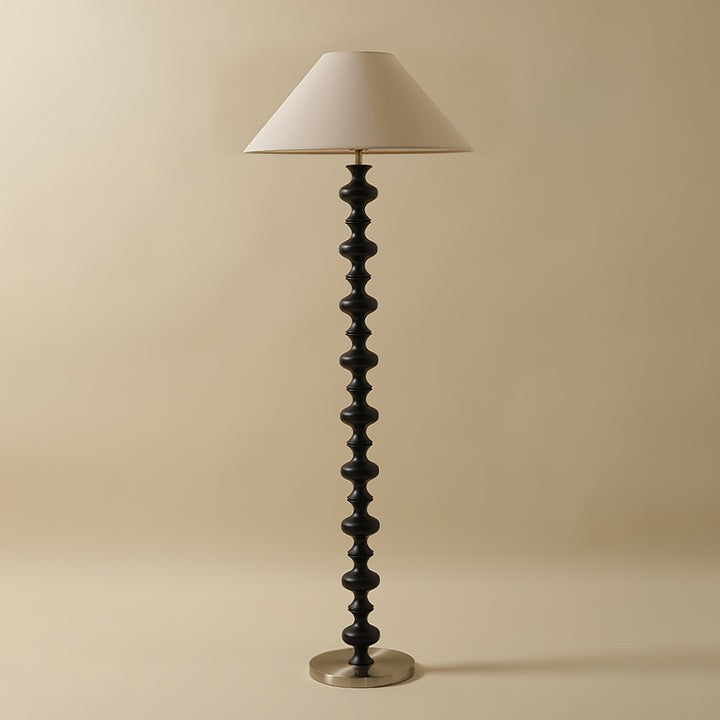 Rhythmic Sculpted Wooden Floor Lamp with Pleated Shade