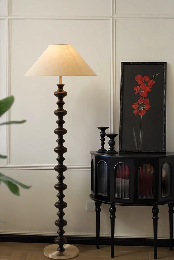 Rhythmic Sculpted Wooden Floor Lamp with Pleated Shade