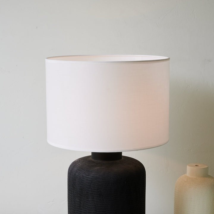 Textured Matte Black Ceramic Table Lamp with White Drum Shade