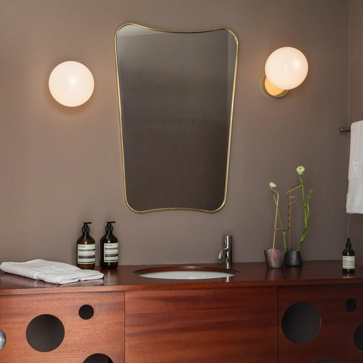 Tip of the Tongue Gold Metal Wall Sconce with White Glass Shade