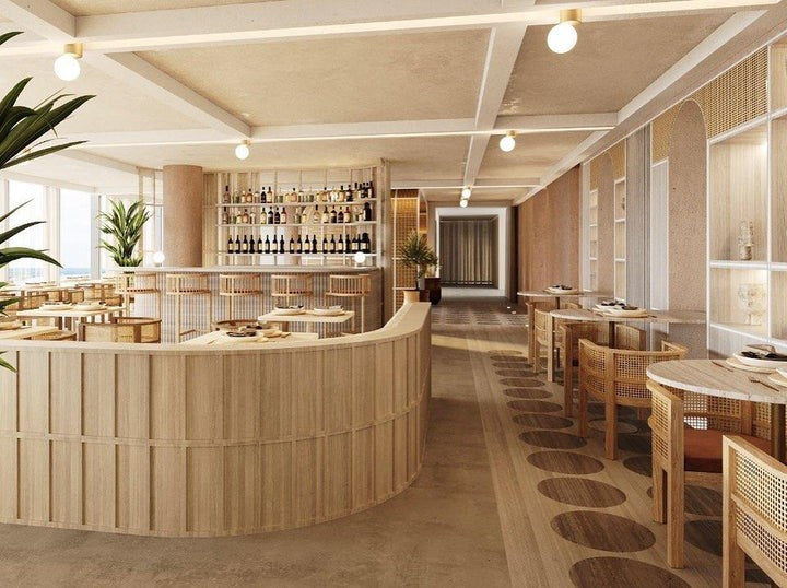 Tip of the Tongue Gold Metal Wall Sconce with White Glass Shade