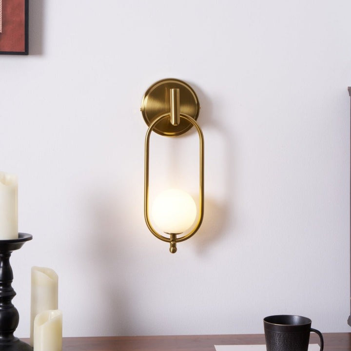 Brushed Brass Wall Sconce with Frosted Glass Globe