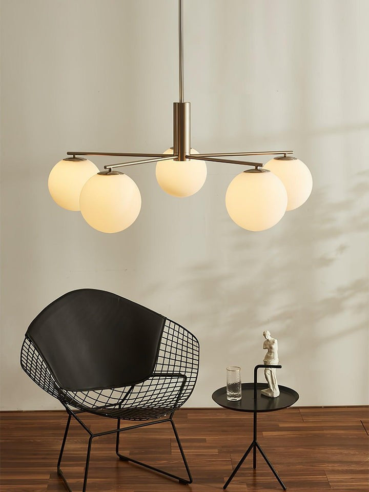 Mid-Century Gold Cross Frame Chandelier with White Glass Globes