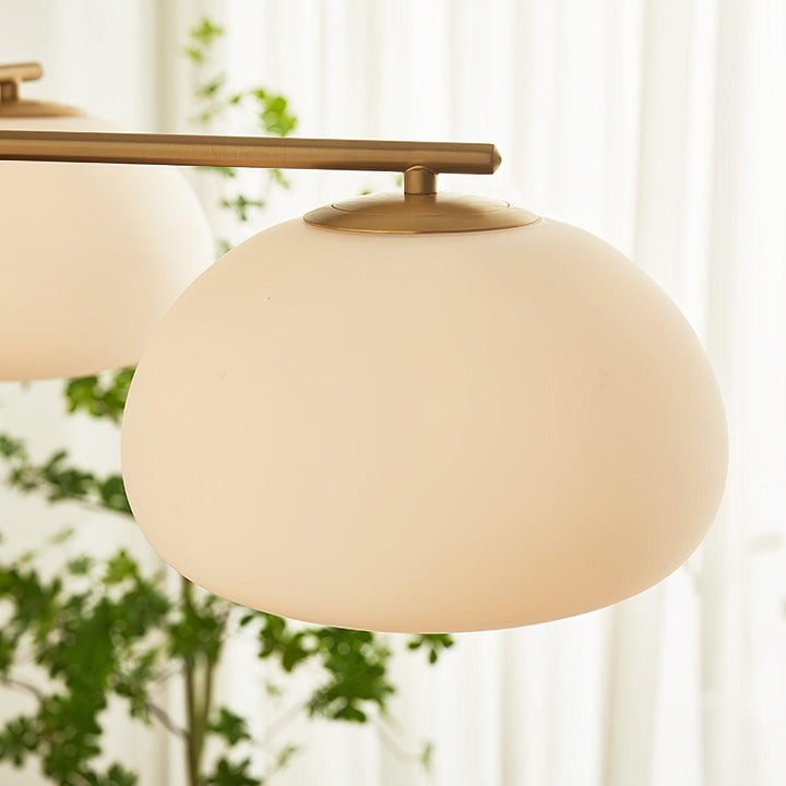 Mid-Century Gold Cross Frame Chandelier with White Glass Globes
