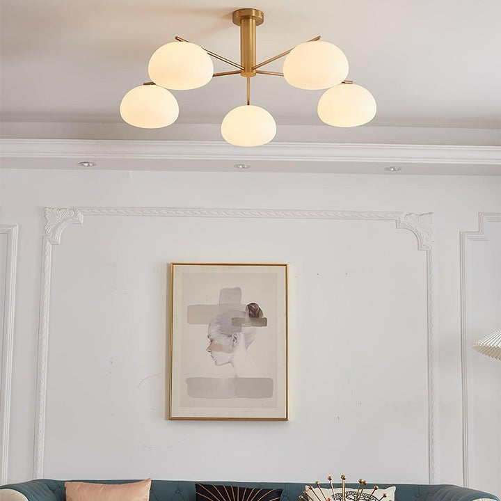 Mid-Century Gold Cross Frame Chandelier with White Glass Globes