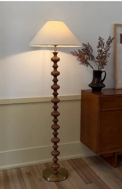 Rhythmic Sculpted Wooden Floor Lamp with Pleated Shade
