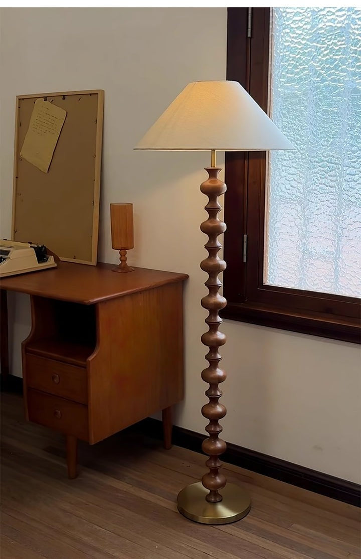 Rhythmic Sculpted Wooden Floor Lamp with Pleated Shade