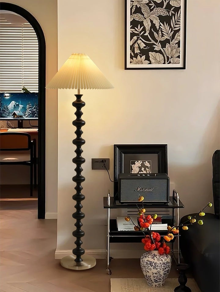 Rhythmic Sculpted Wooden Floor Lamp with Pleated Shade