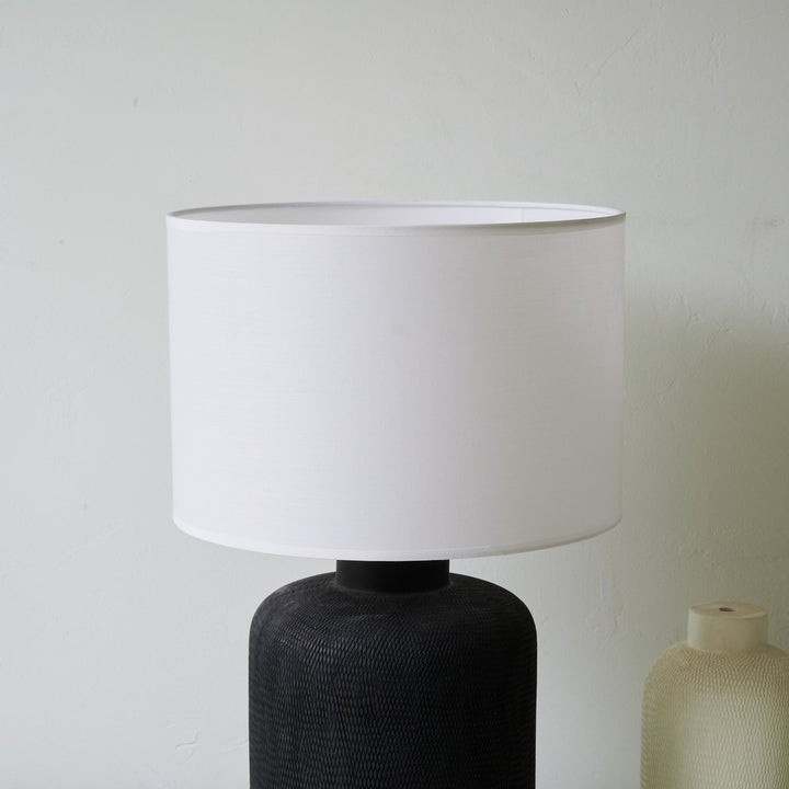 Textured Matte Black Ceramic Table Lamp with White Drum Shade