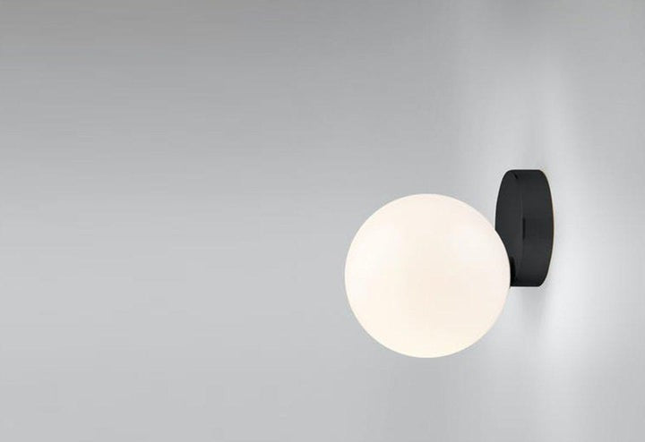 Tip of the Tongue Gold Metal Wall Sconce with White Glass Shade