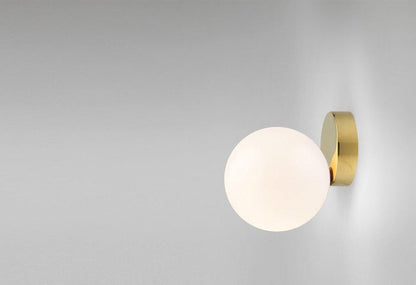 Tip of the Tongue Gold Metal Wall Sconce with White Glass Shade